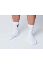 White neptune athletics crew socks with black trident logo