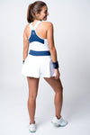Neptune athletics white tennis skirt with navy blue waistband and mint trident logo on back bottom right corner