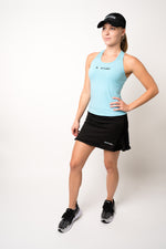 Black neptune athletics tennis skirt and blue tank top