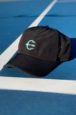 Trident hydro-lite hat, black with mint green trident