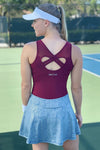 Neptune Athletics cobra skin silver vantage tennis skirt and wine cross back vantage top